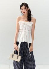 Lace-Up Strapless Peplum Top